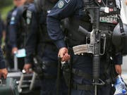 Beamte der mexikanischen Bundespolizei. (Bild: KEYSTONE/AP/MARCO UGARTE)