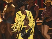 Der Song «Old Town Road» von US-Rapper Lil Nas X hat den Rekord für die längste Zeit an der Spitze der US-Single-Charts gebrochen. (Bild: Keystone/AP Invision/CHRIS PIZZELLO)