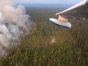 In Sibirien ist bei Bränden eine Waldfläche in der Grösse von drei Vierteln der Schweiz abgebrannt. (Bild: KEYSTONE/AP Russian Federal Agency of Forestry)