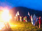 In Mürren im Berner Oberland protestierte die Alpen-Initiative am Samstagabend mit einem Mahnfeuer gegen die Zerstörung der Alpen als Folge des Klimawandels. (Bild: Compte Twitter de Maya Graf)