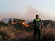 Ein Waldbrand auf der spanischen Ferieninsel Gran Canaria hat bereits eine Fläche von über 1500 Hektar verwüstet. (Bild: KEYSTONE/AP Guardia Civil)