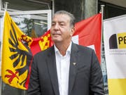 Bläst zum Sturm auf den Nationalrat: Eric Stauffer, frisch gebackener Kandidat auf einer Unterliste der BDP Genf vor den Medien. (Bild: KEYSTONE/SALVATORE DI NOLFI)