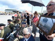 Am Sonntag hat in Polen eine Veranstaltung zum Gedenken einer umstrittenen Untergrundorganisation vom zweiten Weltkrieg stattgefunden - es hagelte aber auch vielerorts Kritik an dem Vorgehen. (Bild: KEYSTONE/AP/CZAREK SOKOLOWSKI)