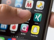 Xing wächst - auch in der Schweiz. Inzwischen zählt das berufliche Netzwerk hierzulande über 1,1 Millionen Mitglieder. (Bild: KEYSTONE/CHRISTIAN BEUTLER)