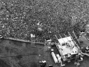 Volle Agenda, Kinderhütedienst oder ein Filmangebot: Bands wie die Beatles, die Rolling Stones oder Led Zeppelin liessen sich das Musikfestival des Jahrhunderts entgehen. (Bild: Keystone/AP/MARTY LEDERHANDLER)