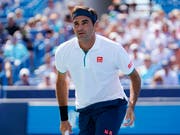 Trotz seiner schnellsten Niederlage seit 2003 nahm Roger Federer das frühe Ausscheiden in Cincinnati relativ gelassen (Bild: KEYSTONE/AP/JOHN MINCHILLO)