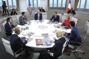 Die Staatschefs der wichtigsten westlichen Industrienationen am runden Tisch vereint. (Bild: Markus Schreiber/AP, Biarritz, 25. August 2019)