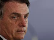 Schwer beleidigt: Bevor er wieder mit sich reden lässt, will der brasilianische Präsident Bolsonaro eine Entschuldigung vom französischen Präsidenten Macron. (Bild: KEYSTONE/AP/ERALDO PERES)