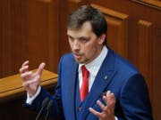 Erst 35 Jahre alt und schon Regierungschef der Ukraine: Alexej Hontscharuk vor dem Parlament in Kiew. (Bild: KEYSTONE/EPA/SERGEY DOLZHENKO)