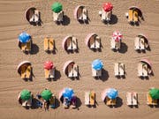 Schöne Ferien leben in attraktiven Bildern weiter. Bildgalerien und Diashows bieten ungeahnte Möglichkeiten, um die Ferienschätze Freunden und Bekannten zu präsentieren. (Bild: KEYSTONE/EPA ANP/SEM VAN DER WAL)