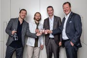 Die Geschäftsleitungen von WfW und Schindler freuen sich über die Zusammenarbeit. V.l.n.r.: Joel Dickenmann (Co-Geschäftsleiter Schweiz, WfW), Morris Etter (Co-Gründer und Vorsitz Geschäftsleitung, WfW), Patrick Hess (CEO Schindler Schweiz), Thomas Oetterli (CEO Schindler Group) (Foto: Philipp Schmidli)