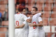 Kein Problem für die Schweizer U21 im Ländle (von links): Jérémy Guillemenot, Noah Okafor, Bastien Toma und Andi Zeqiri. (Bild: Keystone).