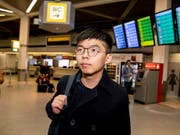 Der Aktivist aus Hongkong, Joshua Wong, ist am Montag in Berlin angekommen. (Bild: KEYSTONE/AP dpa/CHRISTOPH SOEDER)
