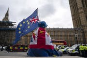 Eine Brexit-Gegnerin in London. (Bild: EPA)