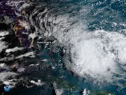 Ein neuer Tropensturm zieht am verwüsteten Norden der bahamas vorbei. «Humberto» bringe heftige Regenfälle und Sturmböen in die Region um die Abaco-Inseln, meldete der US-Wetterdienst am Samstag. (Bild vom 13. September) (Bild: KEYSTONE/EPA NOAA/NOAA HANDOUT)
