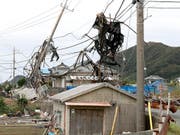 «Faxai» war am Montag vergangener Woche mit Rekordwindstärken auf die Region Chiba südöstlich von Tokio getroffen und hatte Stromleitungen niedergerissen. (Bild vom 13. September) (Bild: KEYSTONE/AP Kyodo News/TAKUYA INABA)