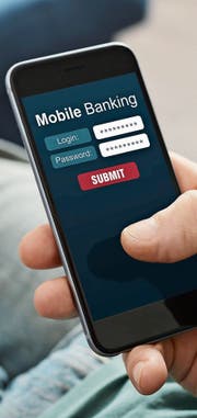 Mobile Banking und damit auch Smartphone-Banken werden immer populärer. Aber auch traditionelle Institute mischen mit. Bild: Getty
