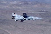 Eine MiG-23 über dem Testgelände. (Bild: Pinterest)