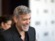 Unter anderem US-Schauspieler George Clooney kauft Yachten vom italienischen Luxusboothersteller Ferretti. (Bild: KEYSTONE/AP Invision/GRANT POLLARD)