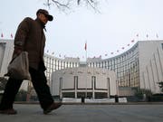 China will ähnliche Digitalwährung wie Facebook herausbringen. (Bild: KEYSTONE/AP/VINCENT THIAN)