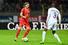 Michael Lang (links) gegen Abdelkarim Hassan. (Bild: Gian Ehrenzeller / Keystone (Lugano, 14. November 2018))