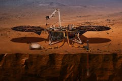 So könnte «InSight» nach der Landung aussehen. Die beiden wichtigsten Instrumente SEIS (vorn links) und HP3 (vorn rechts) hat der Roboterarm der Sonde bereits auf die Mars-Oberfläche abgesetzt. (Illustration: PD/NASA/JPL)