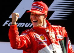 Hier feiert der Ferrari-Fahrer seinen 74. Sieg am Formel-1-Grand-Prix in Italien. (Bild: EPA PHOTO/DPA/OLIVER MULTHAUP, 14. September 2003)