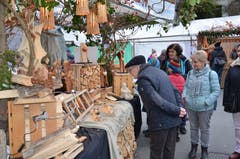 ... oder am Stand des Holzbildhauers Reto Odermatt.