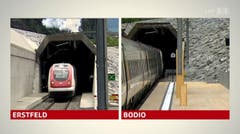 Fast synchron: Die Eröffnungszüge fahren aus dem Tunnel. (Bild: Alptransit Livestream)