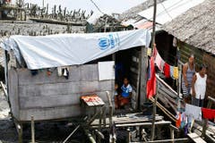 In der Stadt Tacloban wurden die Häuser durch Haiyan zerstört und notdürftig wieder aufgebaut. Mehr als 7300 Menschen verloren ihr Leben im Jahrhundertsturm (Bild: Keystone)