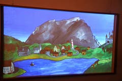 Bei der Beamer-Animation von Raphael von Matt wird die Landschaft Bild für Bild, Bauwerk um Bauwerk zubetoniert. (Bild: Romano Cuonz/Neue NZ)