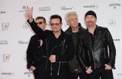 Bono und seine Jungs von U2 grüssen Fotografen und Fans. (Bild: Keystone)