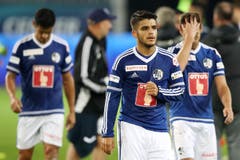 Enttäuschung bei Luzerns Ricardo Costa, Francisco Rodriguez und Jerome Thiesson (vlnr). (Bild: Philipp Schmidli / Luzerner Zeitung)