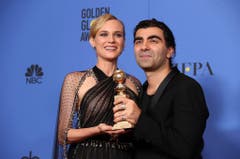 Eine Award für den besten fremdsprachigen Film erhielten Schauspielerin Diane Kruger und Regisseur Fatih Akin für "Aus dem Nichts" geehrt. (Bild: Keystone)