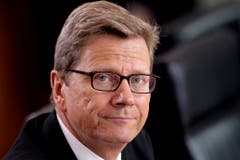 Der frühere FDP-Politiker erfreute sich im Mai 2013 im deutschen Kabinett noch bester Gesundheit. (Bild: Keystone)