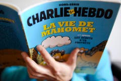 "Das Leben Mohammeds": Aufnahme der hoch umstrittenen Spezialausgabe von "Charlie Hebdo" vom Januar 2013. (Bild: Keystone)