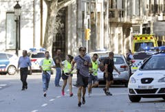 A van crashes into pedestrians in Barcelona (Bild: Keystone)