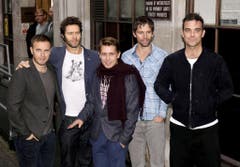 Comeback mit der alten Truppe: 2010 bringt Robbie Williams (r.) mit seinen alten Kollegen von Take That ein neues Album heraus. (Bild: Keystone)