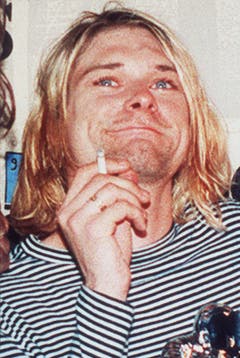 Wasserblaue Augen, strähnige Haare und Kleider aus dem 2nd-Hand-Laden: Kurt Cobain in einer Aufnahme von 1993. (Bild: Keystone)