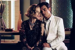Zusammen mit Schauspielerin Nicole Kidman covert Robbie Williams 2001 den Frank-Sinatra-Klassiker "Somethin' Stupid". Der Song und das Album "Swing When You're Winning" werden ein Verkaufsschlager. (Bild: Keystone)