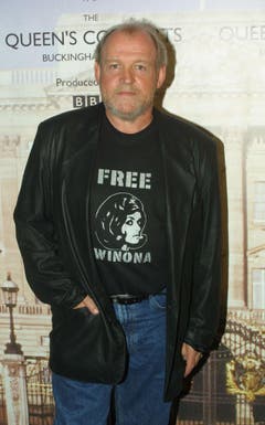 Im Jahr 2002 sang Joe Cocker bei einem Konzert für die Queen - das Bild entstand backstage im Buckingham-Palast. (Bild: Keystone)
