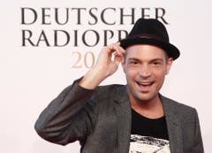 Der Sänger Roger Cicero posiert am 08. September 2011 in Hamburg vor der Verleihung des Deutschen Radiopreises auf dem roten Teppich. (Bild: Keystone)