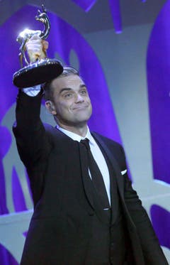 Im November 2013 wird Robbie Williams in Berlin mit einem Bambi in der Sparte "Entertainment" geehrt. (Bild: Keystone)