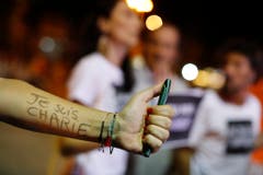 In Rio de Janeiro hat sich eine Frau "Je suis Charlie" auf den Arm geschrieben. (Bild: Keystone)