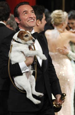 Jean Dujardin mit seinem Hund Uggie. (Bild: Keystone)