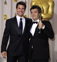 Tom Cruise, links, und «The Artist»-Produzent Thomas Langmann. (Bild: Keystone)