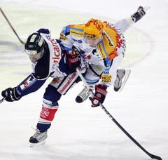 Josh Holden, links, im Spiel gegen Andrey Bykov.