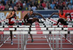 Ryan Wilson (links), David Oliver (mitte) und Antwon Hicks im 110m Hürdenlauf der Männer. (Bild: Philipp Schmidli/Neue LZ)