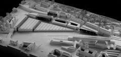 In den 1980er-Jahren wollte die Post hinter dem Hauptbahnhof ein grosses Verteilzentrum einrichten. Im Bild das Siegerprojekt dafür. Ihm wären alle Altbauten – auch das Klubhaus – im Dreieck zwischen St.Leonhard-Strasse (links) und Rosenbergstrasse zum Opfer gefallen. 1995 wurde das Grossprojekt beerdigt. Vorne rechts im Bild Hauptbahnhof und Hauptpost. (Bild: Sammlung Reto Voneschen)