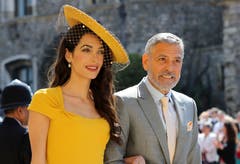 Schauspieler George Clooney und seine Frau Amal kamen als Gäste zur Trauungszeremonie. (Gareth Fuller/pool photo via AP)